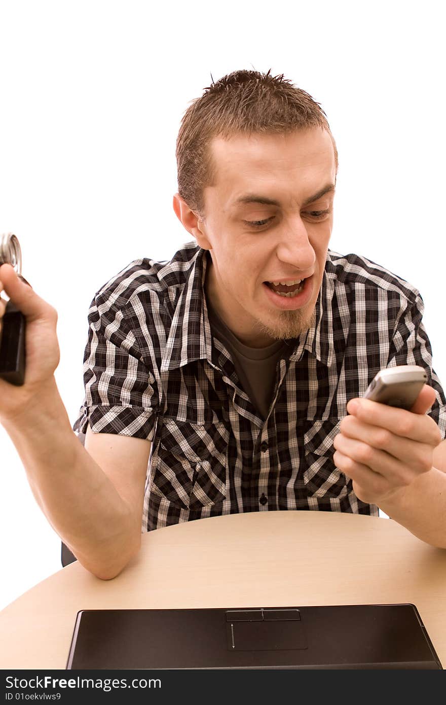 Man with phone working in office