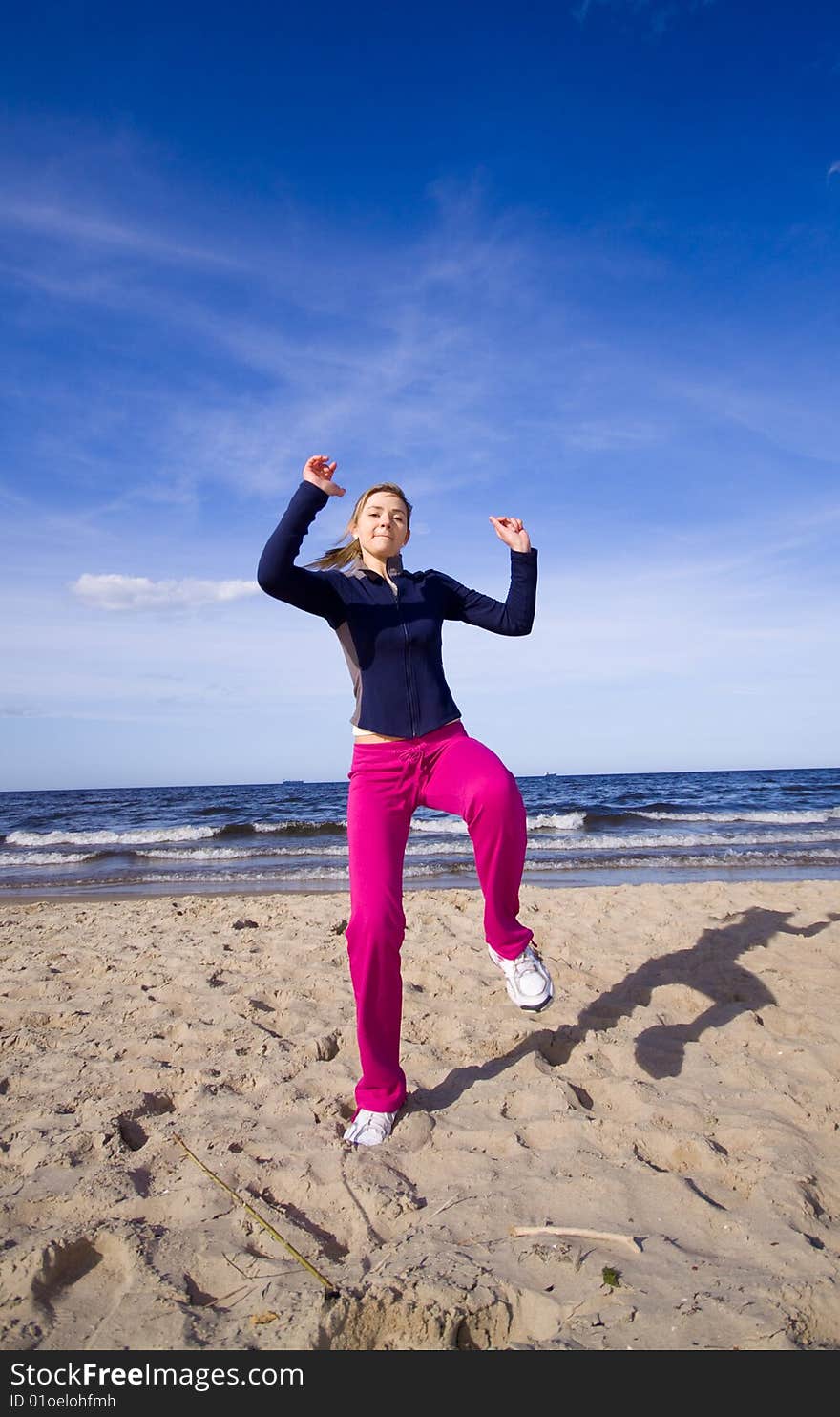 Active woman on the beach