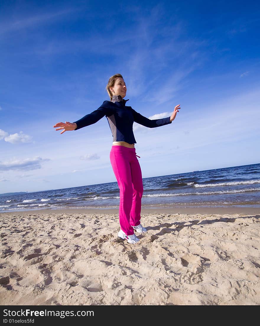 Active woman on the beach