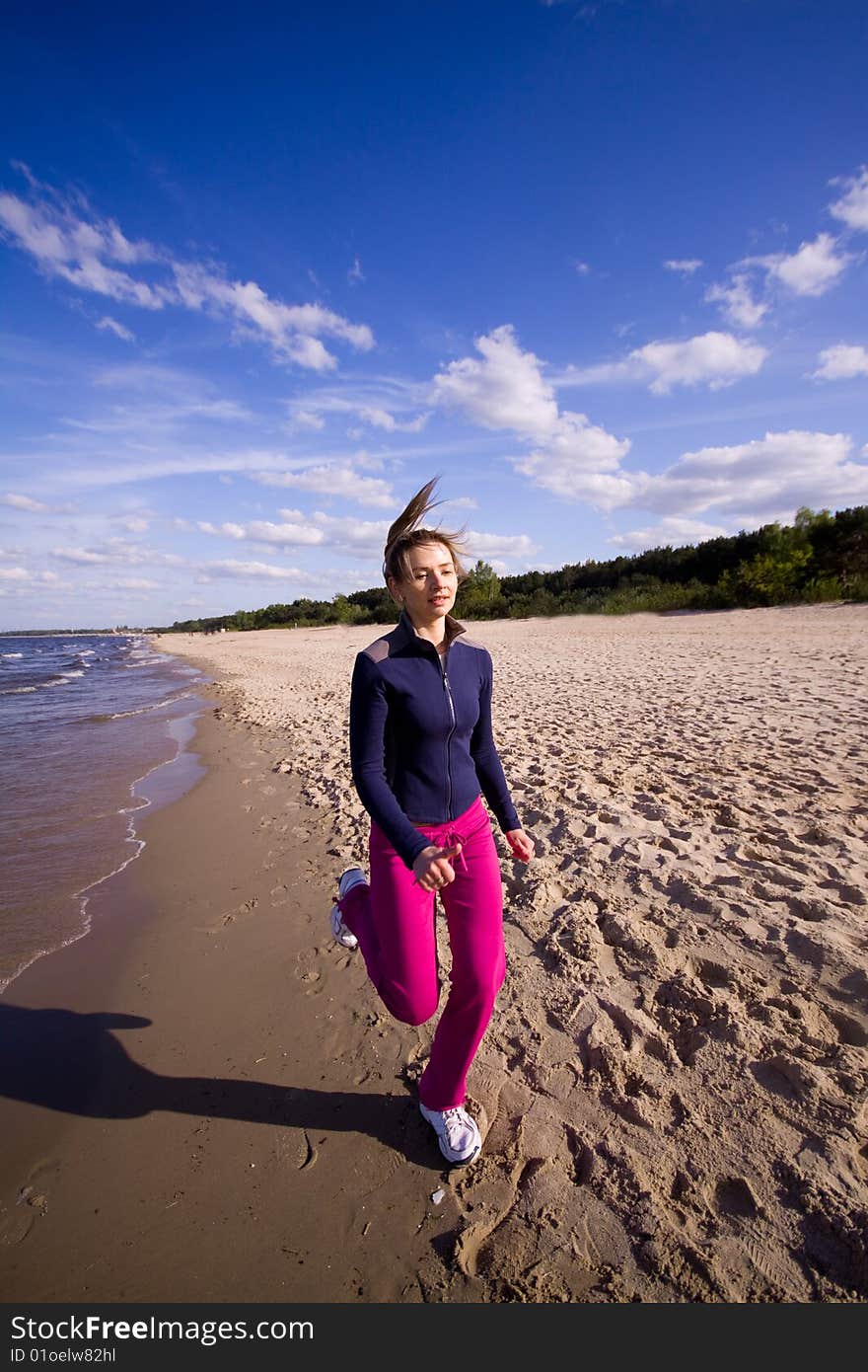 Active woman on the beach