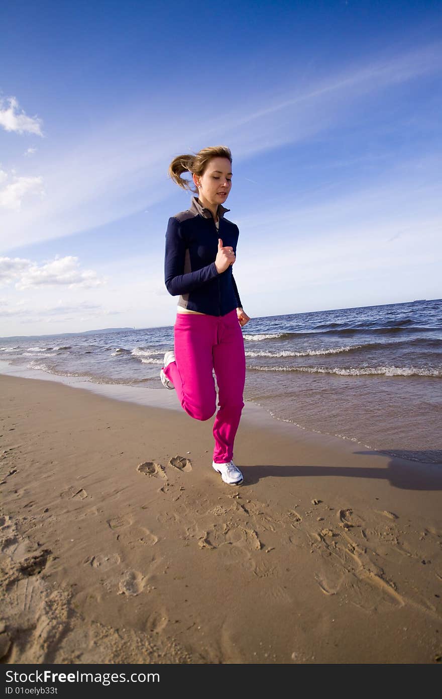 Active woman on the beach