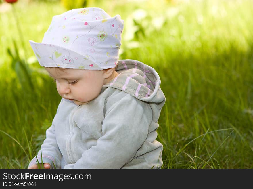 Sweet baby girl on grass. Sweet baby girl on grass