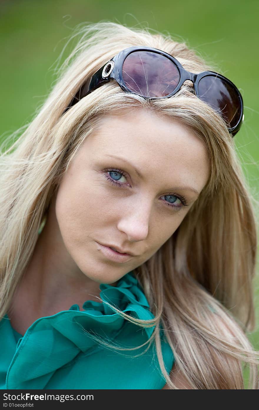 Young woman in sunglasses