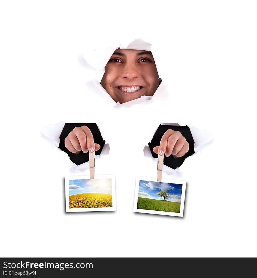 Woman Holding Landscape Photos Thru Wall Hole