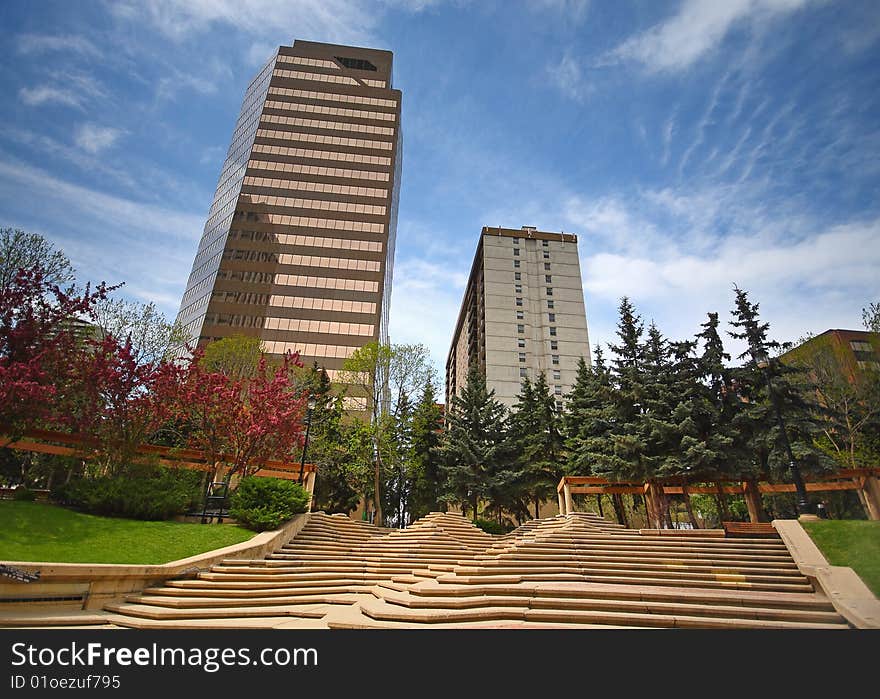 Urban park with towers in background