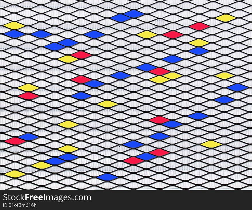 An abstract picture of horizontal diamond shapes in blue, yellow, red and white. An abstract picture of horizontal diamond shapes in blue, yellow, red and white.