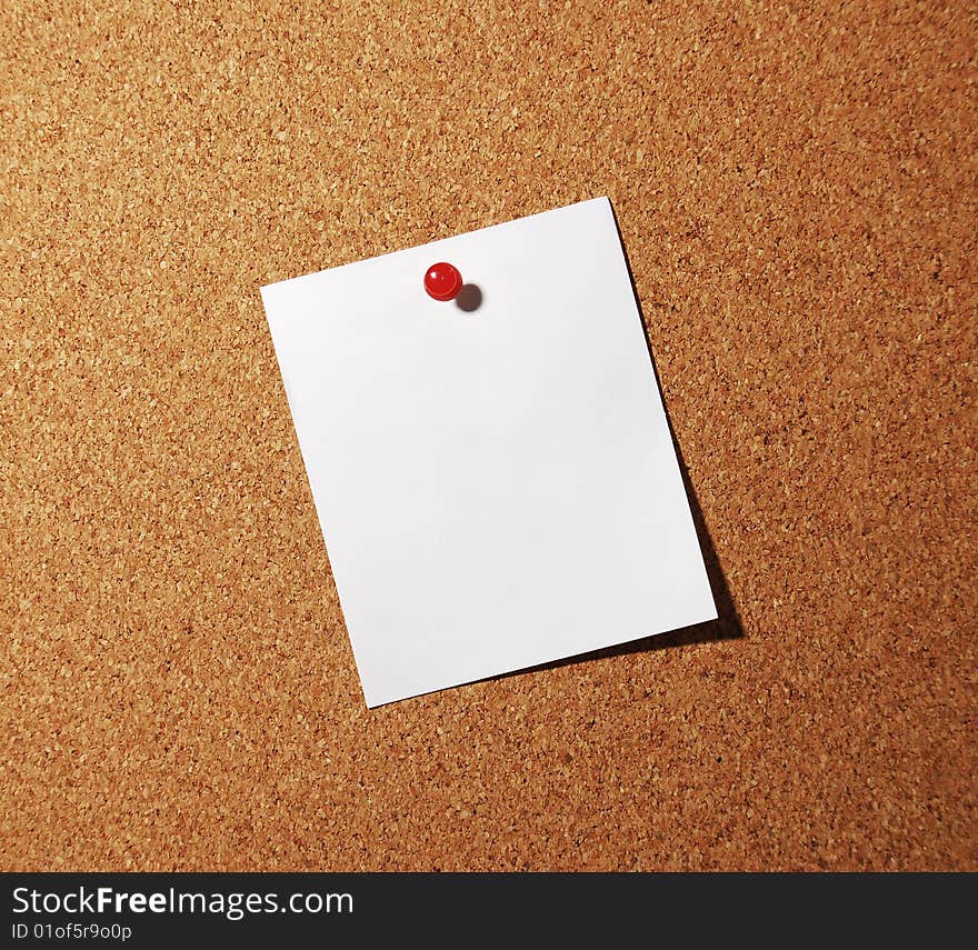 Blank Note and red pin on Corkboard