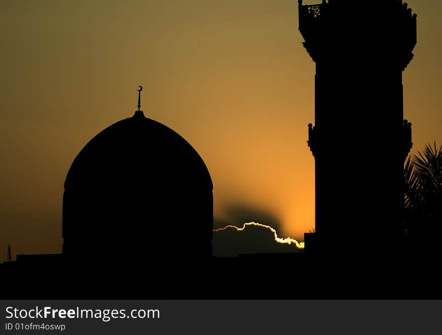 A mosque in downtown Dubai at sunset. A mosque in downtown Dubai at sunset