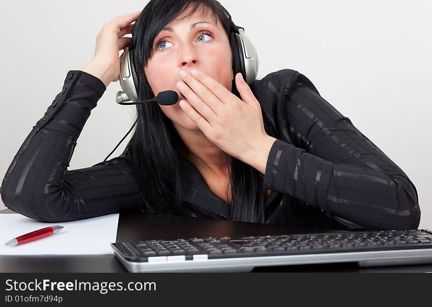 Callcenter agent beeing tired of work. Callcenter agent beeing tired of work