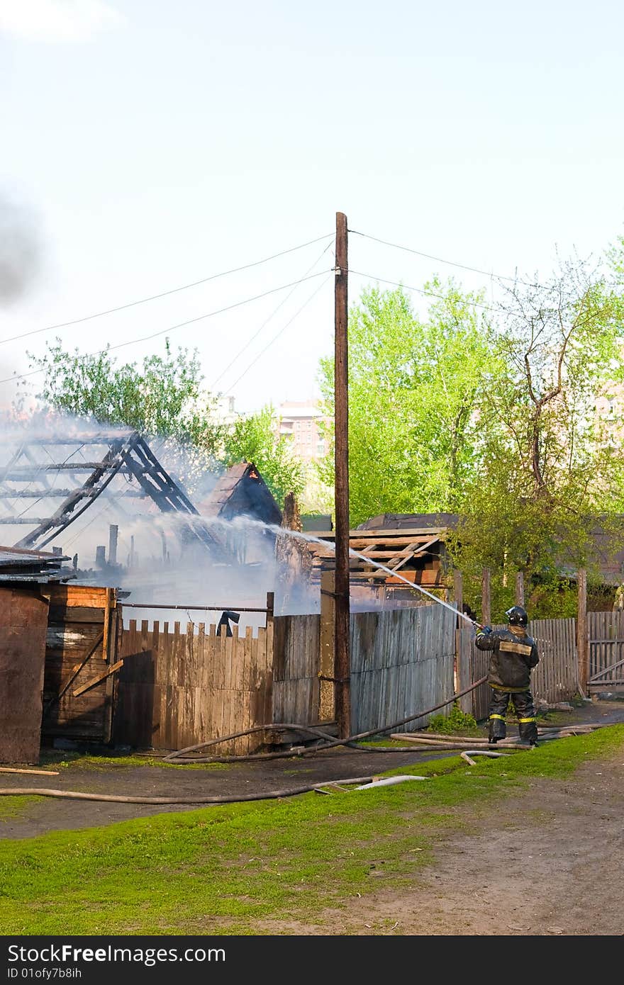 The burning house in a smoke