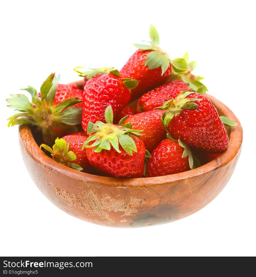 Fresh strawberries on a wooden platter isolated on white background. Fresh strawberries on a wooden platter isolated on white background