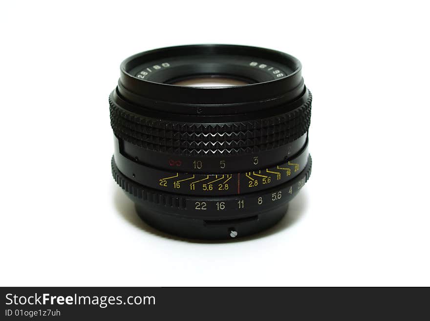 Old photo camera lens on white background