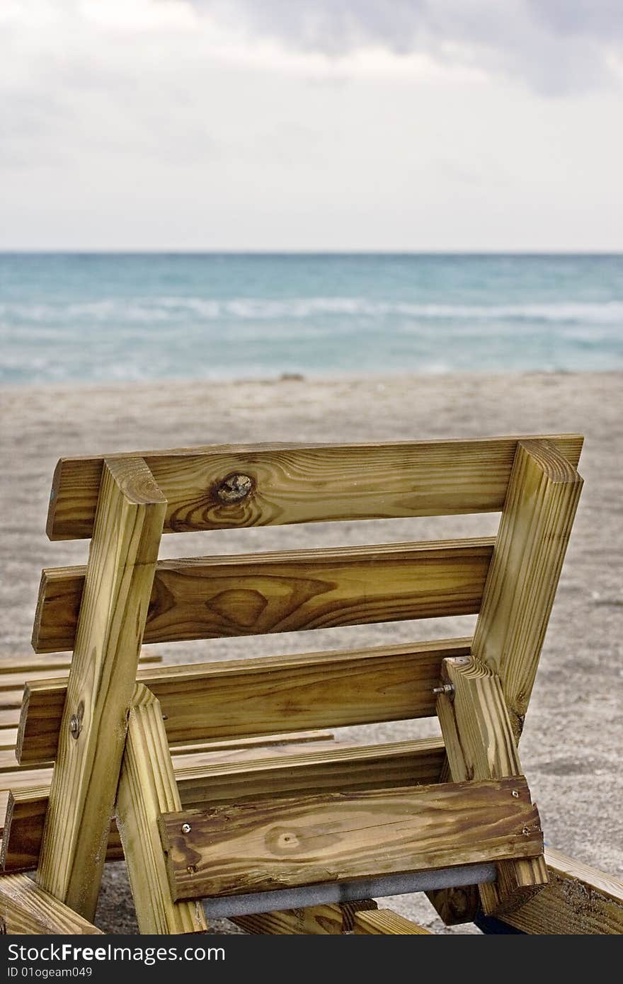 Beach sunrise with chair