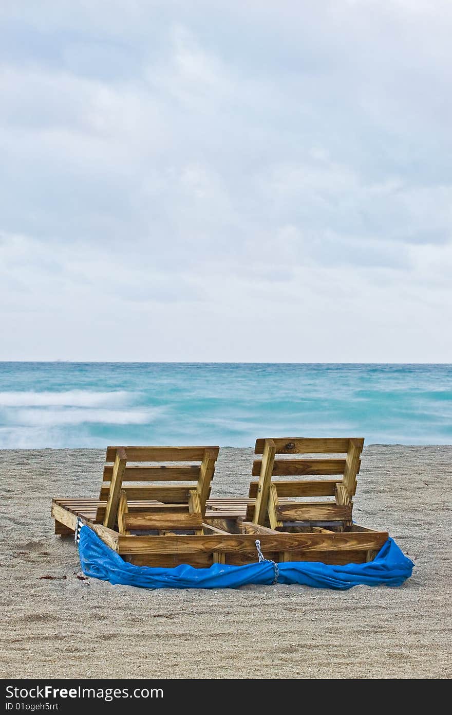 Beach chairs after sunrise during Miami Beach summer season. Beach chairs after sunrise during Miami Beach summer season