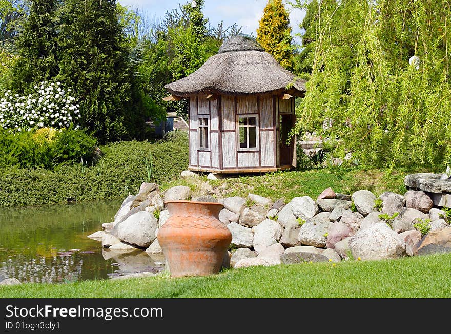 Beautiful and peaceful green Japanese water garden. Beautiful and peaceful green Japanese water garden