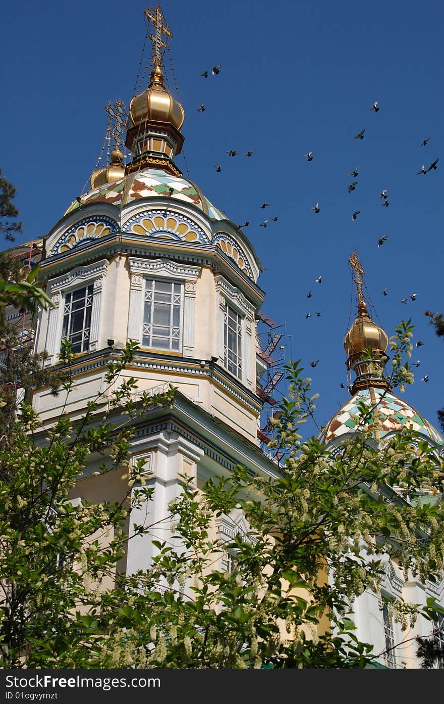 Peaceful Doves flying over Orthodox Cathedral, Almaty. Peaceful Doves flying over Orthodox Cathedral, Almaty