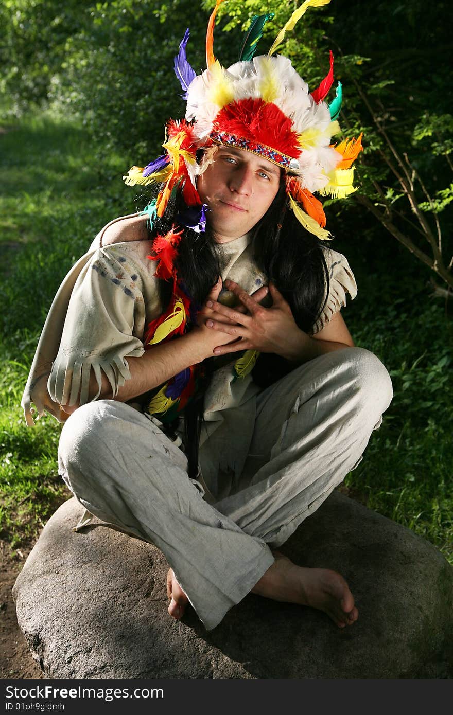 Indian sitting on the stone. Indian sitting on the stone.