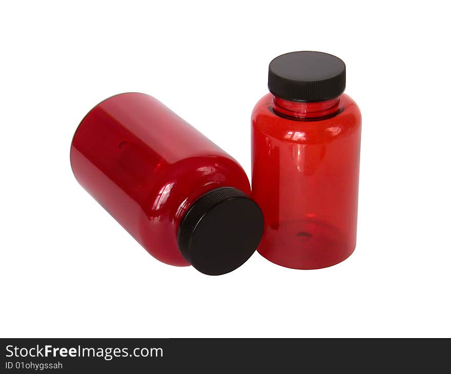 Empty bottles for capsules on a white background