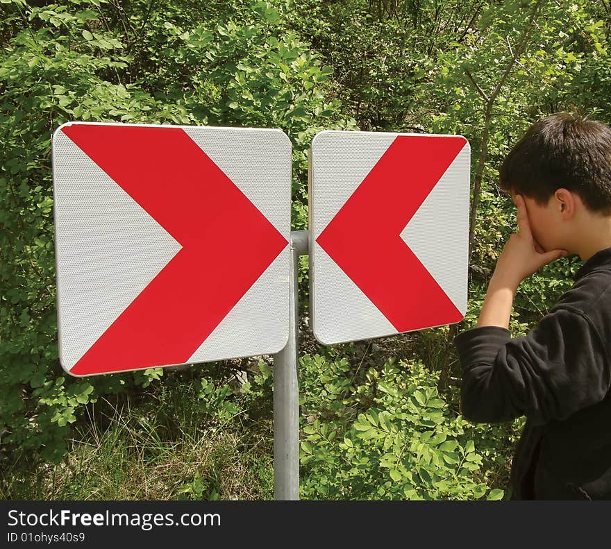 Boy on roads and sign in different way. Boy on roads and sign in different way