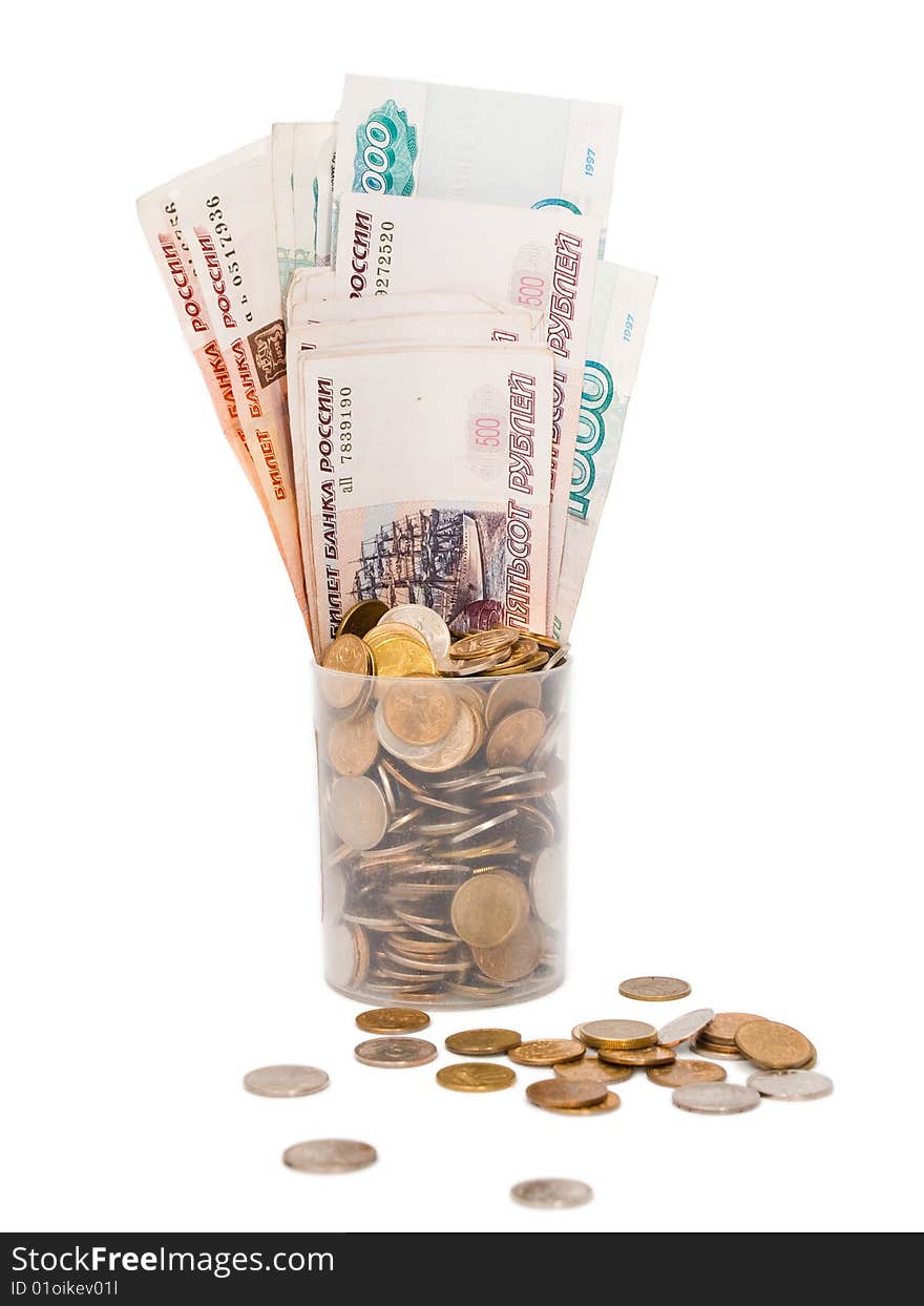 Plastic cup with russian coins and banknotes of different dignity on a white background, isolated. Plastic cup with russian coins and banknotes of different dignity on a white background, isolated