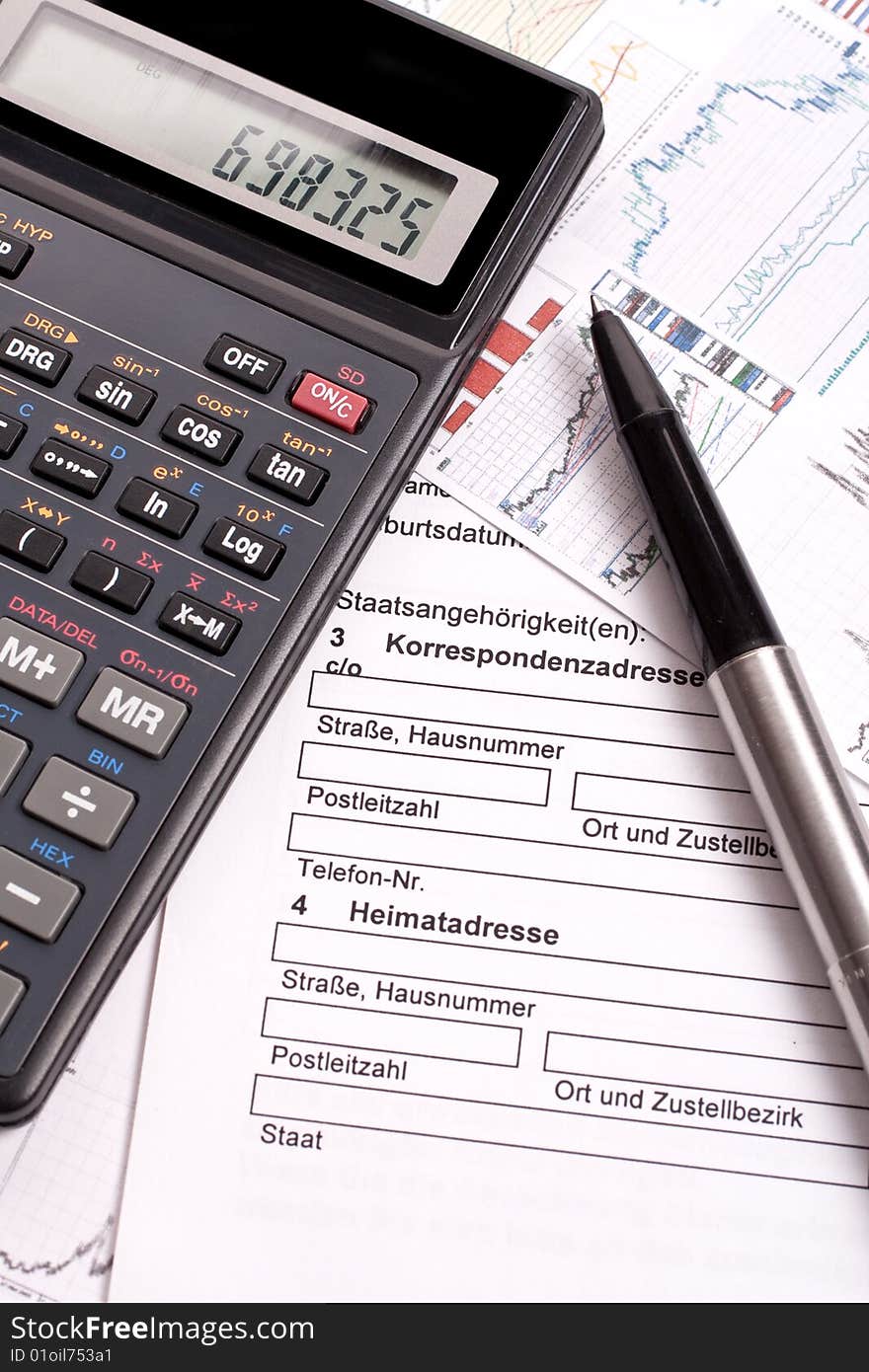 Financial statement with calculator and pen. Financial statement with calculator and pen