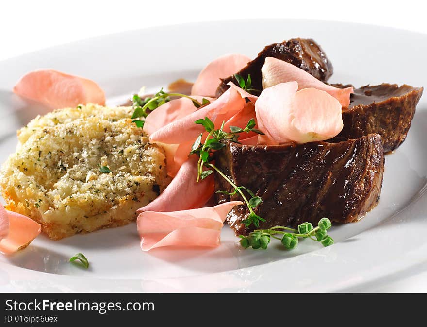 Beef Plate with Potatoes Galette Served with Boiled Rose Petal and Wine Sauce