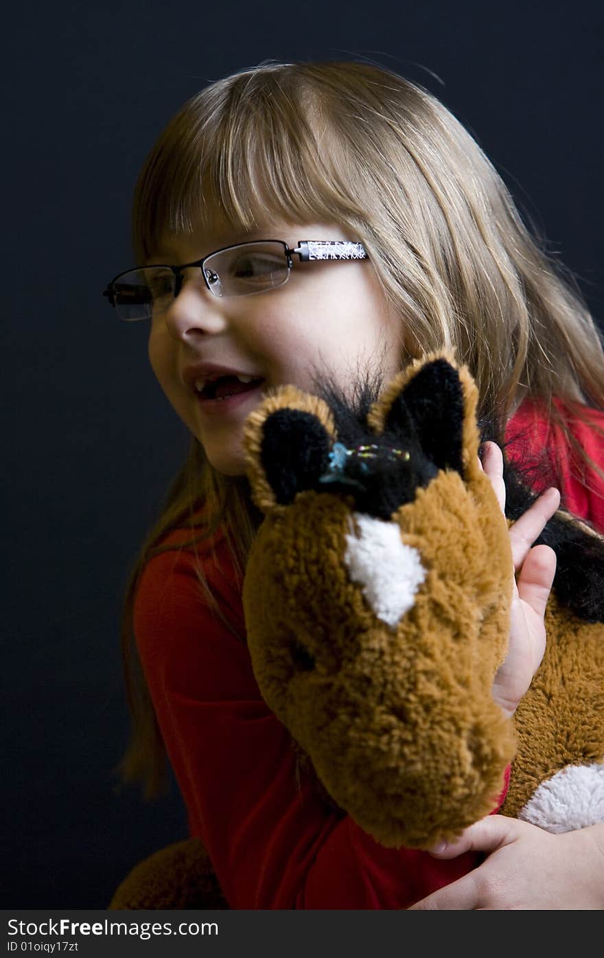 Girl and soft toy