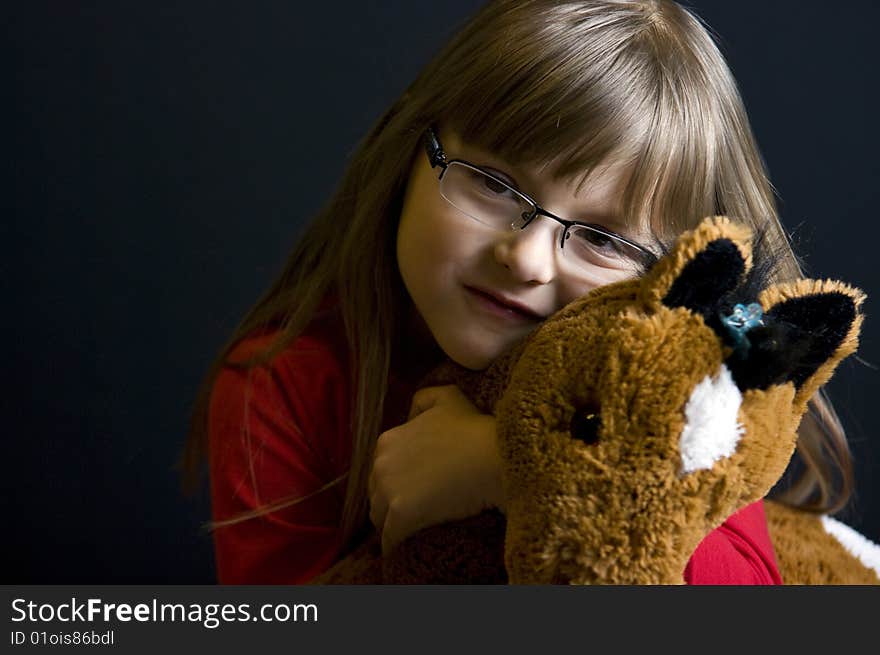 Girl and soft toy