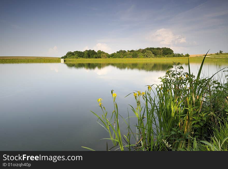 Scene from the artificial lake in the late afternoon. Scene from the artificial lake in the late afternoon