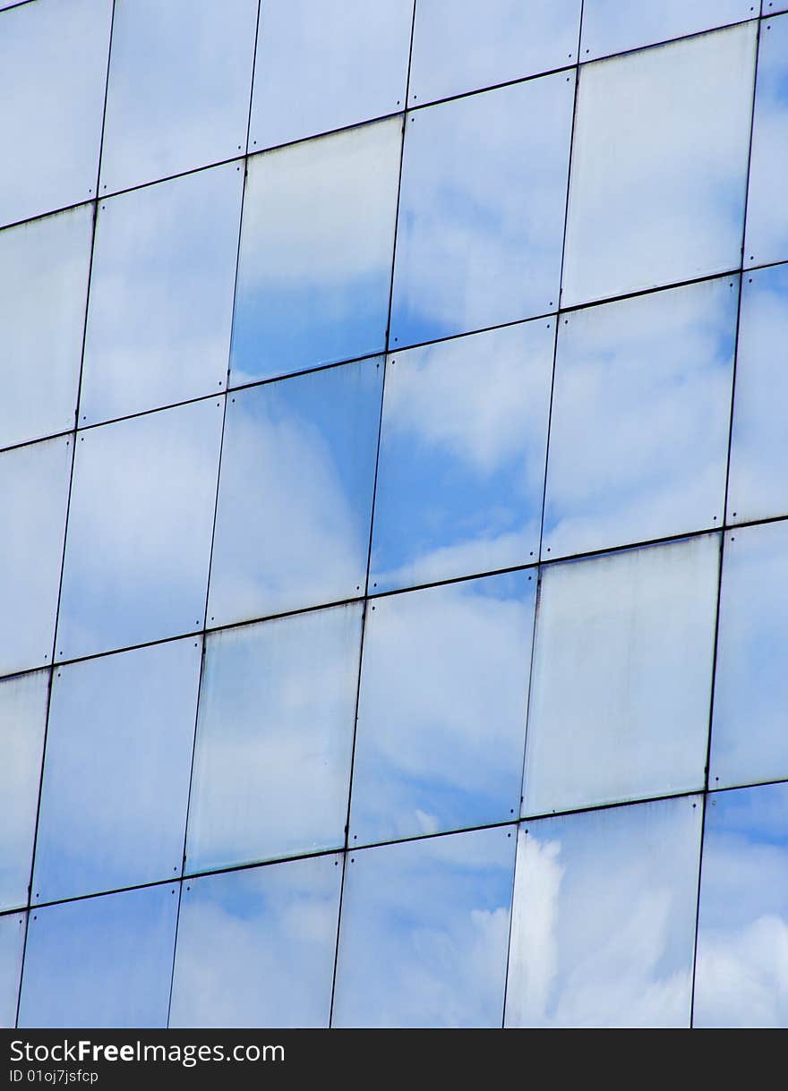 Building windows with sky reflections