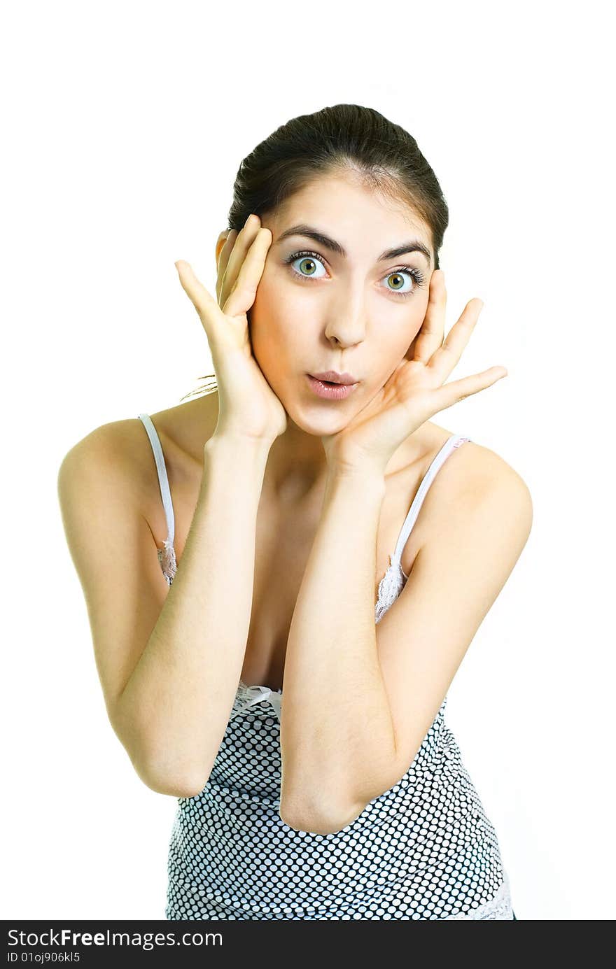 Portrait of a beautiful young surprised woman closing her face with hands. Portrait of a beautiful young surprised woman closing her face with hands