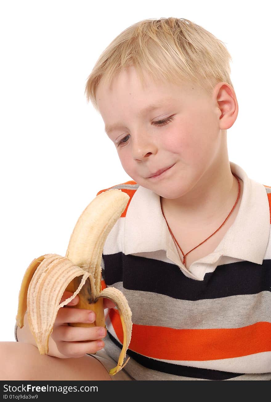 Little beautiful boy eat banana. isolated on white. Little beautiful boy eat banana. isolated on white.