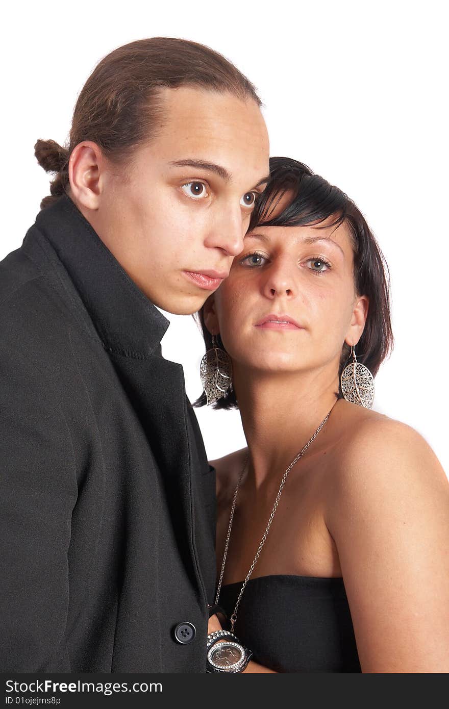 Young stylish couple in love. Isolated over white.