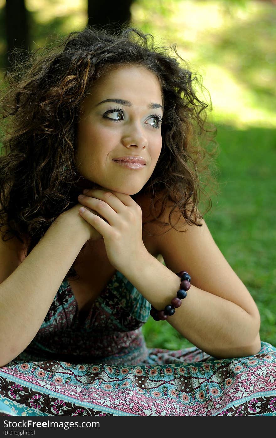 Smile teen standing on field in a park