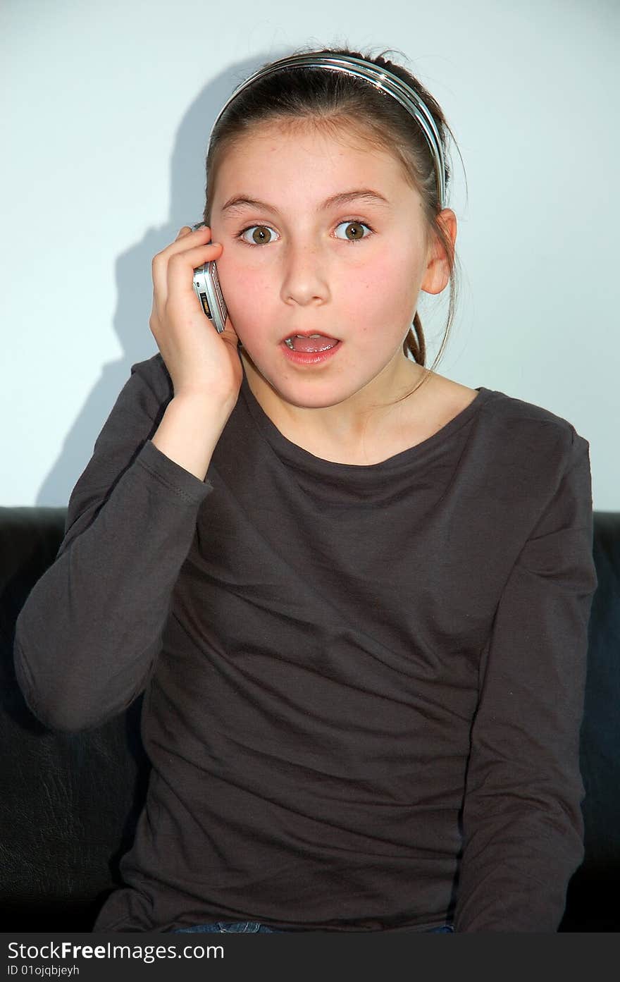 Young girl on mobile phone. Young girl on mobile phone.