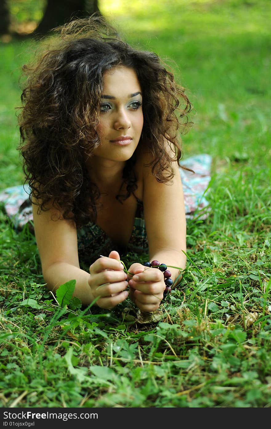 Smile teen standing on field in a park