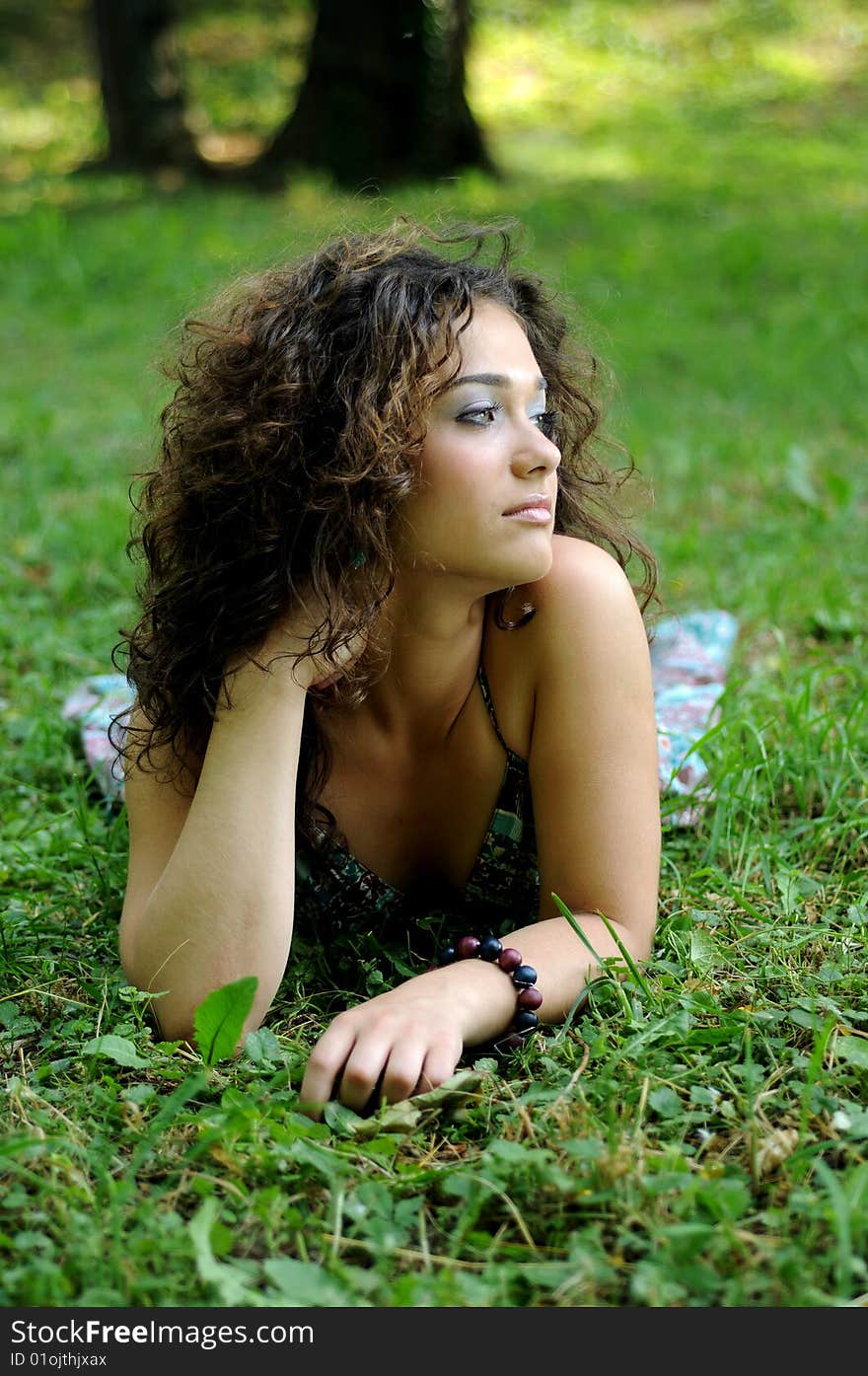 Smile teen standing on field in a park