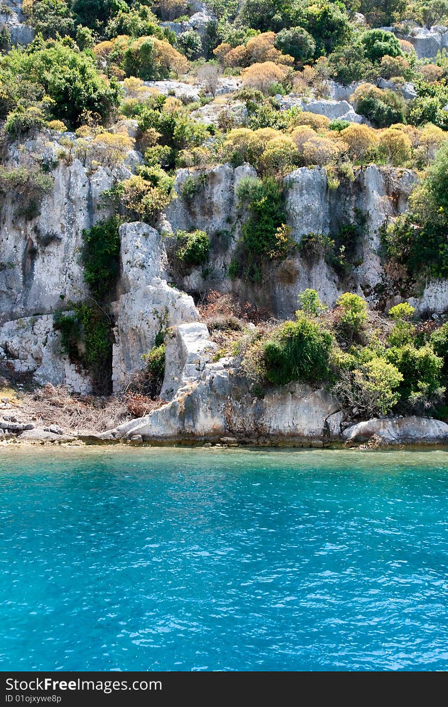 Ruins of old town in the Mediterranean sea