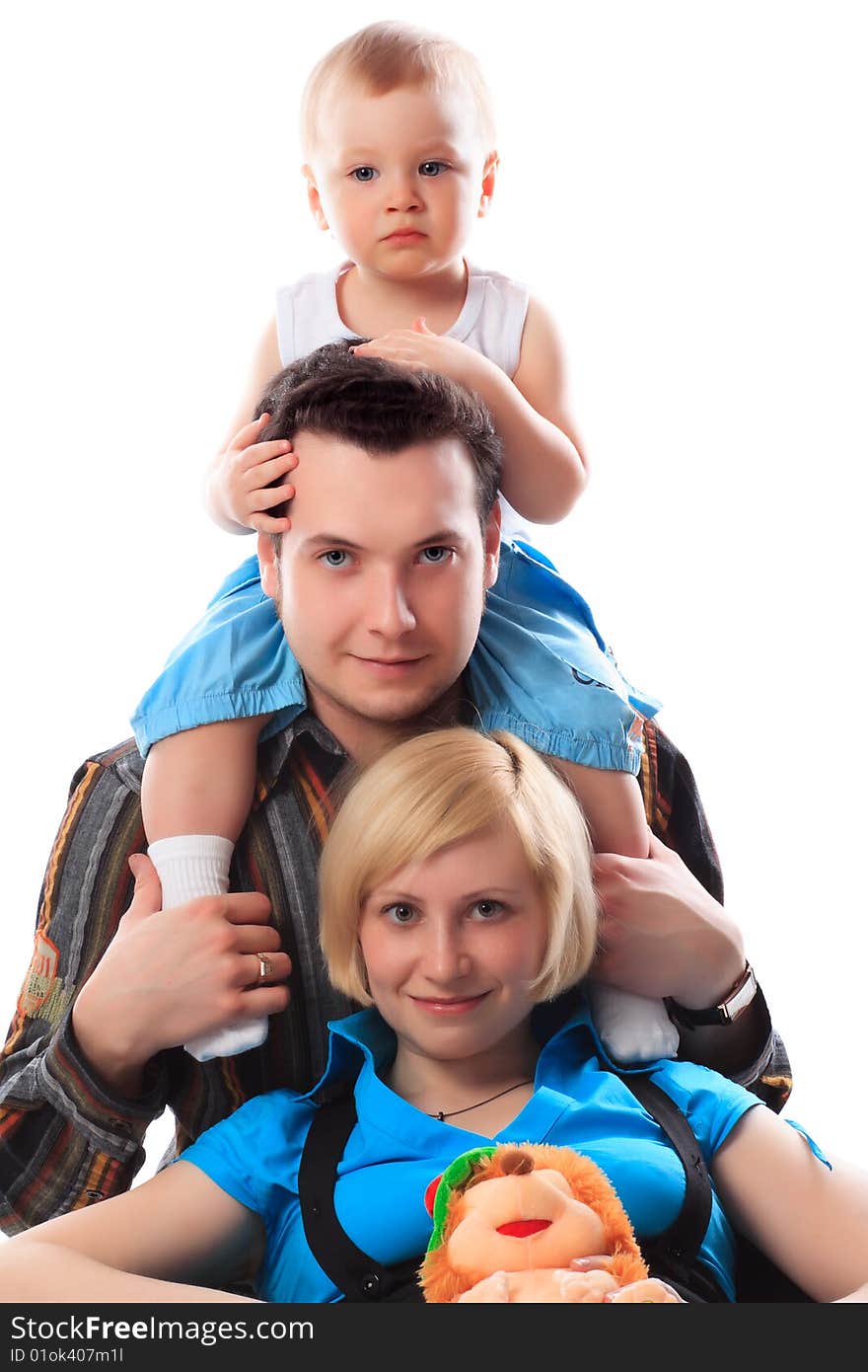 Portrait of a happy family. Shot in a studio.