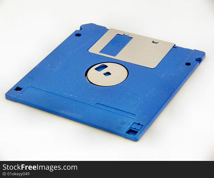 Vintage 3�-inch blue computer floppy disk with metal inlay. Vintage 3�-inch blue computer floppy disk with metal inlay