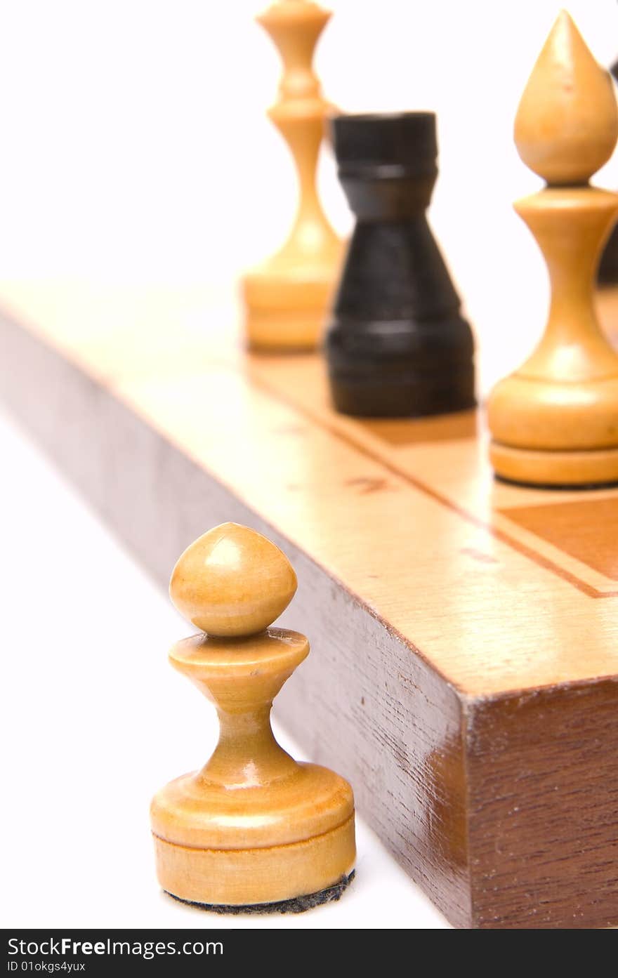 Chessmen on a chessboard, white background