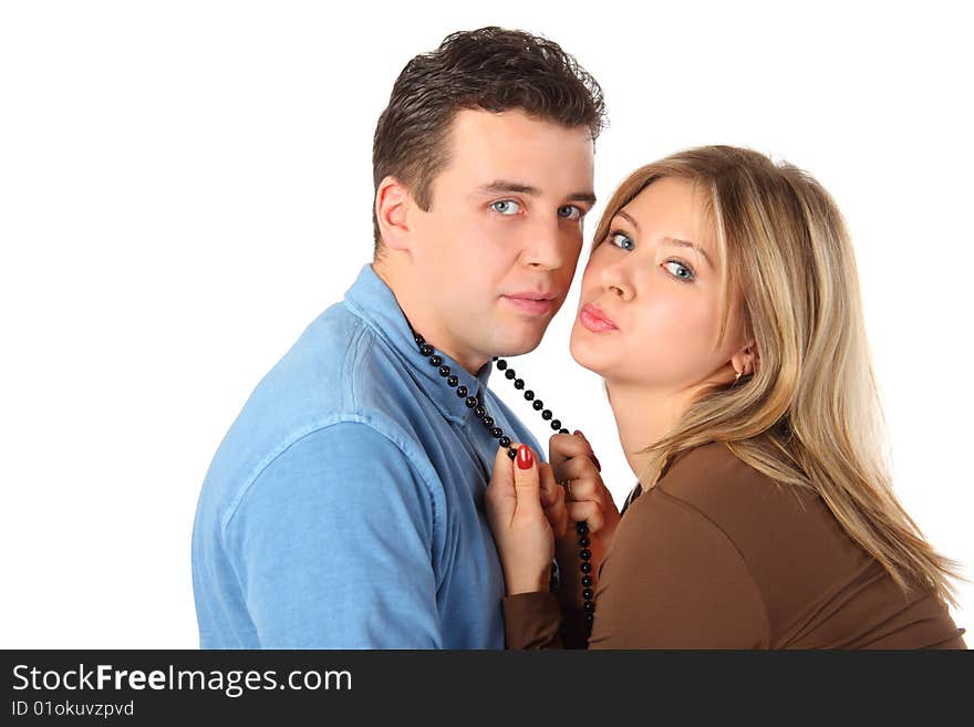 Girl holds man for beads on white background