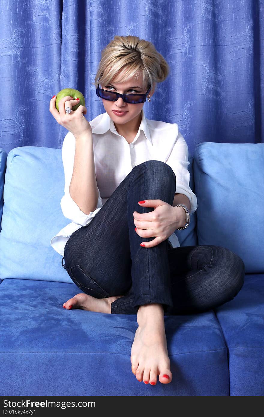 Girl with apple in room