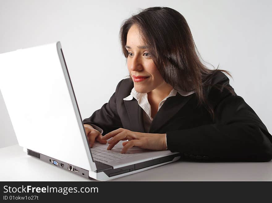 Young business woman with laptop. Young business woman with laptop