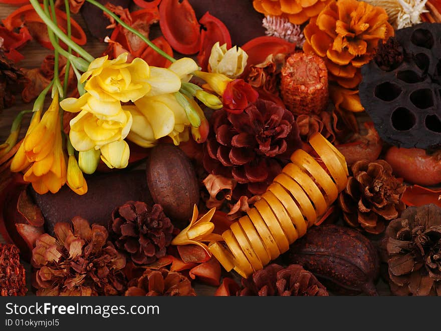 Still-life in red-orange tones with freesias