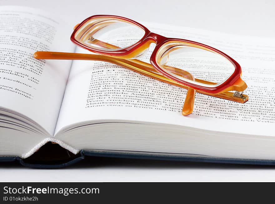 Glasses on a book