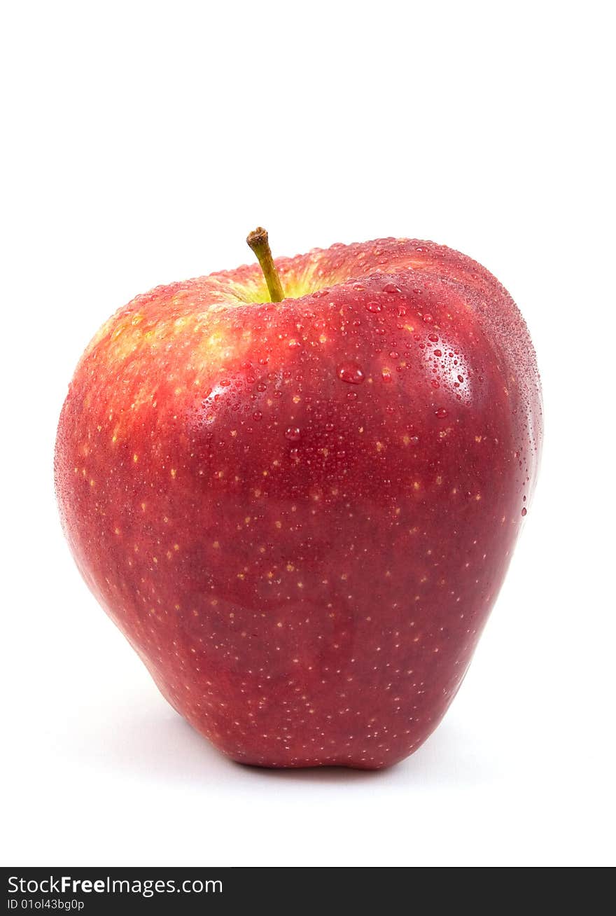 Red apple with water drops on isolated