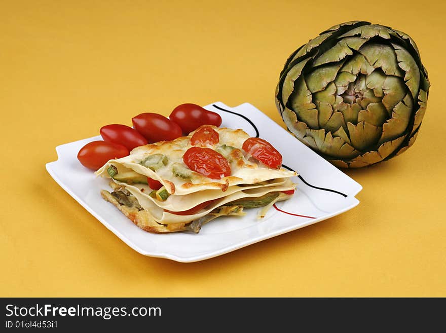 Vegetable lasagna  with an artichoke