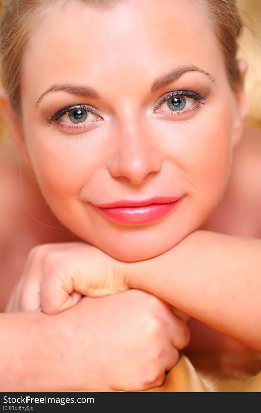 Portrait of the young woman close up