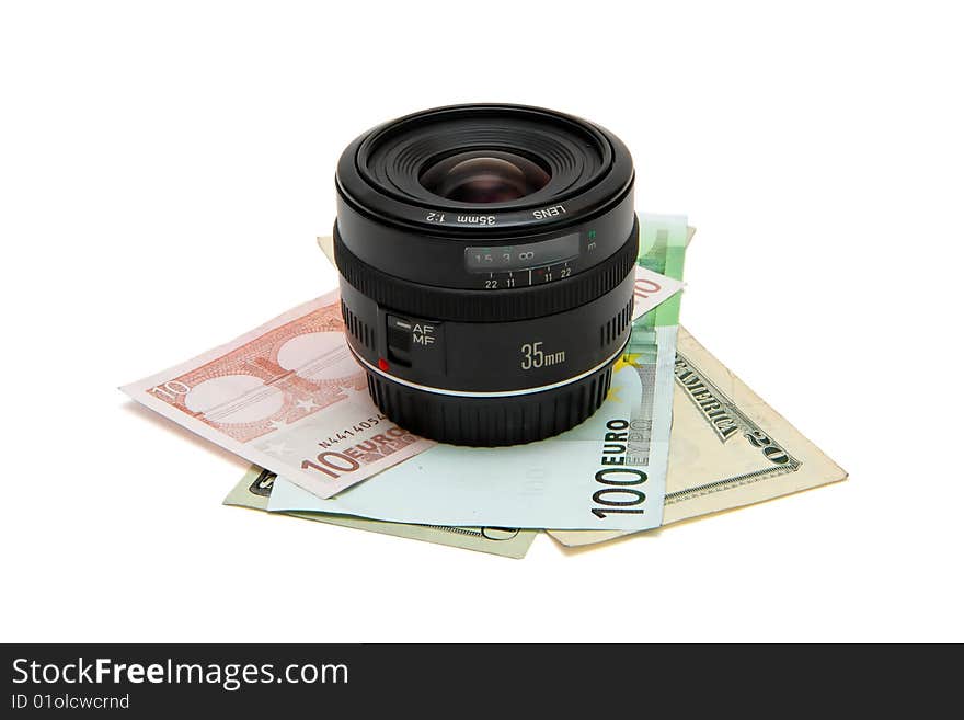 Objective lens on money stack isolated